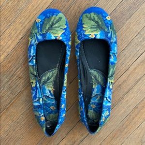 Never worn shoes with tapestry like floral print.